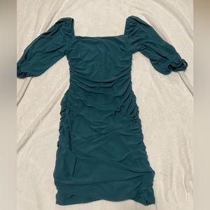 dark green fitted dress
